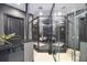 Elegant bathroom with a large walk-in shower and marble tile at 340 S Palm Ave # Pl1, Sarasota, FL 34236