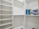 Bright walk-in closet with ample shelving and hanging space at 340 S Palm Ave # Pl1, Sarasota, FL 34236