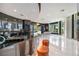 Sleek, modern kitchen with expansive windows and city views at 340 S Palm Ave # Pl1, Sarasota, FL 34236