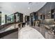 Modern kitchen with dark cabinetry, granite countertops and stainless steel appliances at 340 S Palm Ave # Pl1, Sarasota, FL 34236