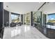 Elegant lounge area with marble floors and modern furniture at 340 S Palm Ave # Pl1, Sarasota, FL 34236