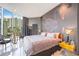 Spacious main bedroom with large swan mural and city views at 340 S Palm Ave # Pl1, Sarasota, FL 34236