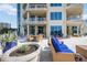 Spacious patio with seating and views of palm trees at 340 S Palm Ave # Pl1, Sarasota, FL 34236