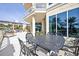 Large patio with table and chairs, ideal for outdoor dining at 340 S Palm Ave # Pl1, Sarasota, FL 34236