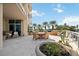 Outdoor patio with seating for relaxing and dining at 340 S Palm Ave # Pl1, Sarasota, FL 34236
