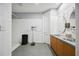 Clean and well-maintained restroom with double sinks and tile floors at 340 S Palm Ave # Pl1, Sarasota, FL 34236