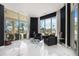 Sitting area with marble floors and large windows at 340 S Palm Ave # Pl1, Sarasota, FL 34236