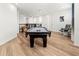 Game room with pool table and comfortable seating at 3704 Wild Blossom Pl, Parrish, FL 34219