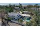 Aerial view of home with private pool and ocean views at 3712 Sandspur Ln, Nokomis, FL 34275