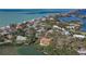 Aerial view showcasing waterfront property and homes at 3712 Sandspur Ln, Nokomis, FL 34275