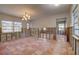 Dining room under renovation with tile floors at 3712 Sandspur Ln, Nokomis, FL 34275