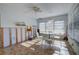Renovation project: Dining room with tiled floor and ample natural light at 3712 Sandspur Ln, Nokomis, FL 34275