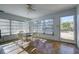 Renovation project: Sunlit dining room with tiled floor and new windows at 3712 Sandspur Ln, Nokomis, FL 34275