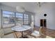 Renovation project: Dining room with large windows and tiled floor at 3712 Sandspur Ln, Nokomis, FL 34275