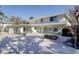 Two-story house with unique architectural details and a spacious driveway at 3712 Sandspur Ln, Nokomis, FL 34275