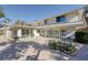 Another view of the house showcasing its curb appeal and landscaping at 3712 Sandspur Ln, Nokomis, FL 34275