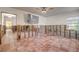 Living room undergoing renovation with tile floors at 3712 Sandspur Ln, Nokomis, FL 34275