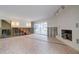 Living area with a fireplace and access to the pool, currently under construction at 3712 Sandspur Ln, Nokomis, FL 34275