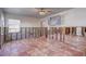 Under renovation living room with exposed framing and tile floor at 3712 Sandspur Ln, Nokomis, FL 34275