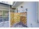 Unique outdoor shower with decorative tile at 3712 Sandspur Ln, Nokomis, FL 34275