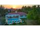 Stunning waterfront home with private pool and sunset views at 3858 Casey Key, Nokomis, FL 34275