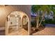 Bright entryway with arched doorways and a tiled floor at 3858 Casey Key, Nokomis, FL 34275