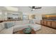 Bright living room with sectional sofa and large windows at 3858 Casey Key, Nokomis, FL 34275