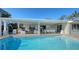 Stunning pool with outdoor kitchen and dining at 3858 Casey Key, Nokomis, FL 34275