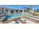 Luxury pool and patio with lounge chairs at 3858 Casey Key, Nokomis, FL 34275