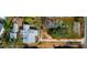Aerial view highlighting a house and two separate vacant lots at 4420 102Nd W St, Bradenton, FL 34210
