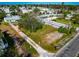 Aerial view of vacant land with nearby houses and mobile homes at 4420 102Nd W St, Bradenton, FL 34210
