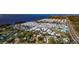 Aerial view of a house near the water, with mobile homes nearby at 4420 102Nd W St, Bradenton, FL 34210