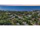 Aerial view of waterfront neighborhood at dusk at 4810 Bay Shore Rd, Sarasota, FL 34234