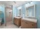 Bright bathroom with double vanity and walk-in shower at 4810 Bay Shore Rd, Sarasota, FL 34234