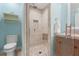 Updated bathroom with walk-in shower and built-in bench at 4810 Bay Shore Rd, Sarasota, FL 34234