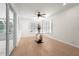 Bright dining room with hardwood floors and access to a patio at 4810 Bay Shore Rd, Sarasota, FL 34234