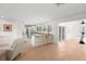 Modern kitchen with white cabinets, granite counters, and stainless steel appliances at 4810 Bay Shore Rd, Sarasota, FL 34234