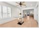 Light and airy living room with hardwood floors and view to entry at 4810 Bay Shore Rd, Sarasota, FL 34234