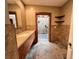 Spa-like bathroom with walk-in shower and double vanity at 5140 Windward Ave, Sarasota, FL 34242