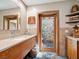 Spa-like bathroom with outdoor shower access at 5140 Windward Ave, Sarasota, FL 34242
