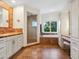 Elegant bathroom with soaking tub and walk-in shower at 5140 Windward Ave, Sarasota, FL 34242
