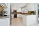Modern kitchen with stainless steel appliances and granite countertops at 5140 Windward Ave, Sarasota, FL 34242