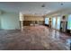 Spacious living area with terracotta tile floors currently under renovation at 5140 Windward Ave, Sarasota, FL 34242
