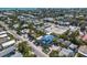 Aerial view of a two-story house near the beach with a pool at 518 Spring Ave, Anna Maria, FL 34216