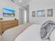 Charming bedroom with a king-size bed and coastal-inspired decor at 518 Spring Ave, Anna Maria, FL 34216