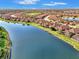 Aerial view of community with lake at 5401 Manchini St, Sarasota, FL 34238