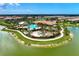Community pool and recreation area with lush landscaping at 5401 Manchini St, Sarasota, FL 34238