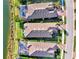 Aerial view of three lakefront homes at 5401 Manchini St, Sarasota, FL 34238