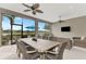 Large back patio with screened enclosure and dining table at 5401 Manchini St, Sarasota, FL 34238