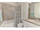 Simple bathroom with shower/tub combo and white vanity at 5401 Manchini St, Sarasota, FL 34238